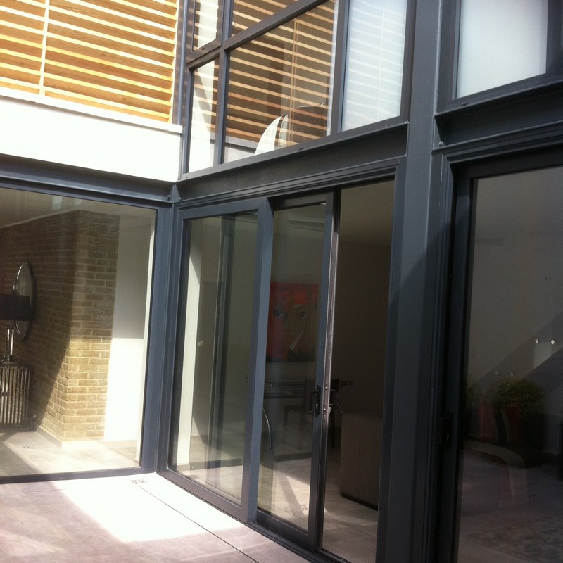 Anthracite aluminium sliding patio doors fitted in Stamford Hill
