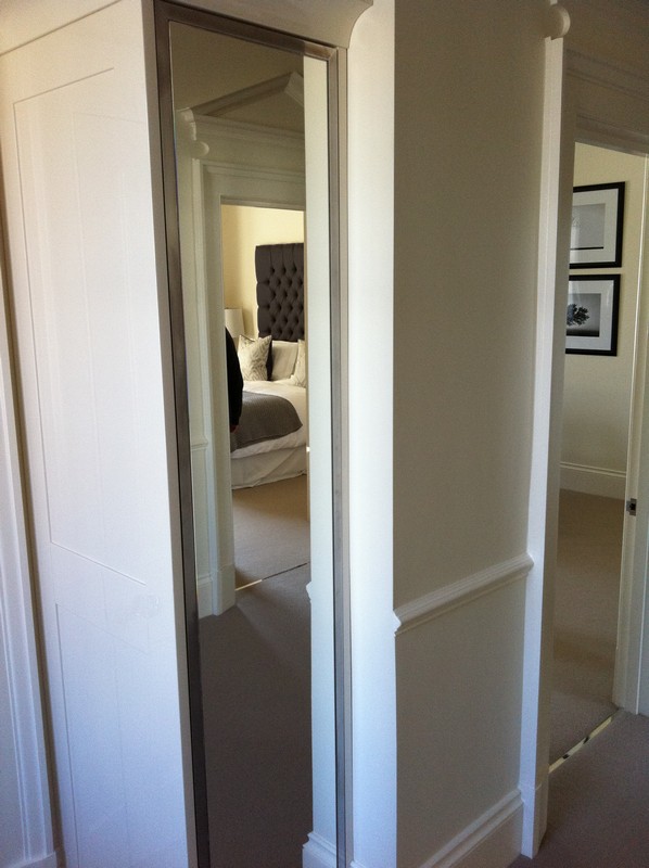 Full-length wardrobe mirror fitted in Stamford Hill home